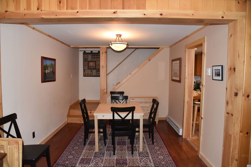 Dining room off of Living Room.  Two small tables can be joined.  Seating for 10