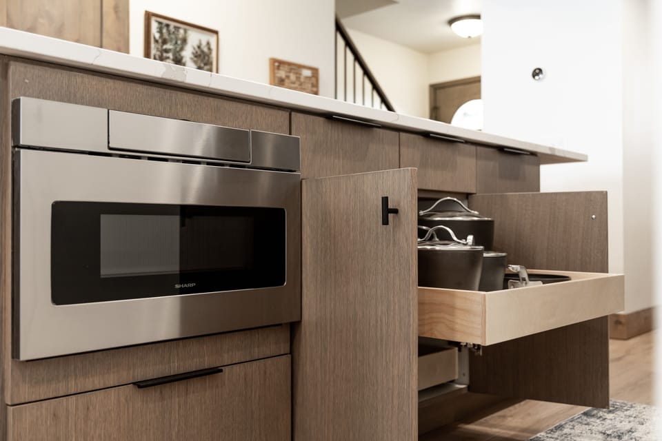 Drawer microwave. Lots of pots and pans to cook with.