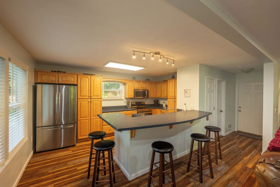Well stocked kitchen makes meal prep easy and fun. With plenty of room for the cooks and the lookers on. 