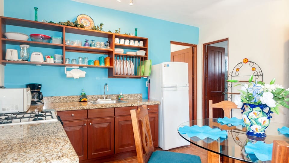 Well equipped kitchen and granite countertops
