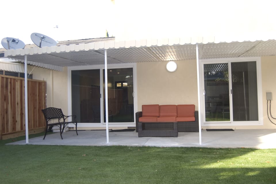 Enjoy an early morning coffee or evening glass of California wine in the back