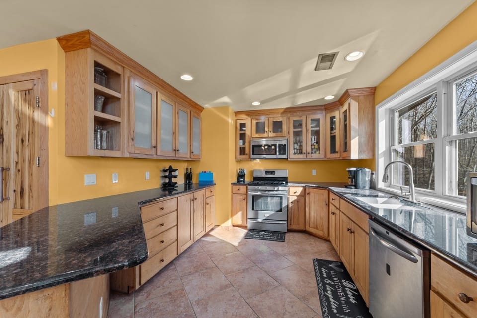 Four people can work together easily in this large kitchen.