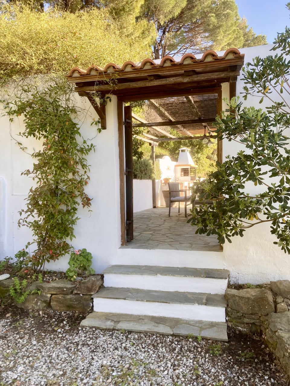 Main entrance through doubler doors to an out door dinning and bbq area. 