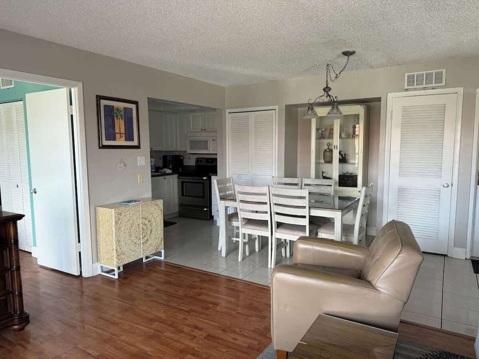 Fully-stocked kitchen with all necessary appliances and cook ware. Dining area.