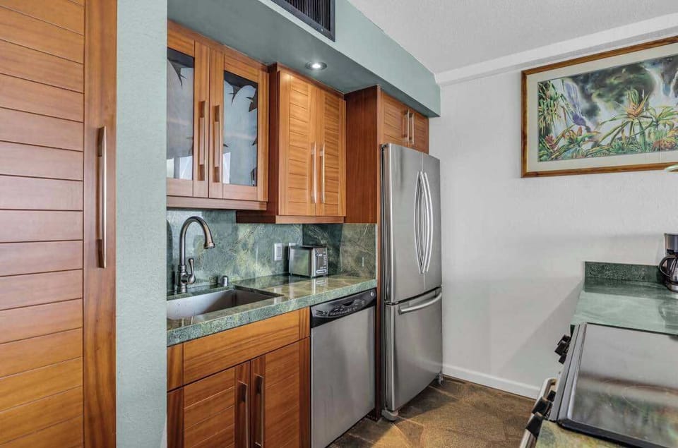 Updated kitchen with Asian Mahagony cabinets.