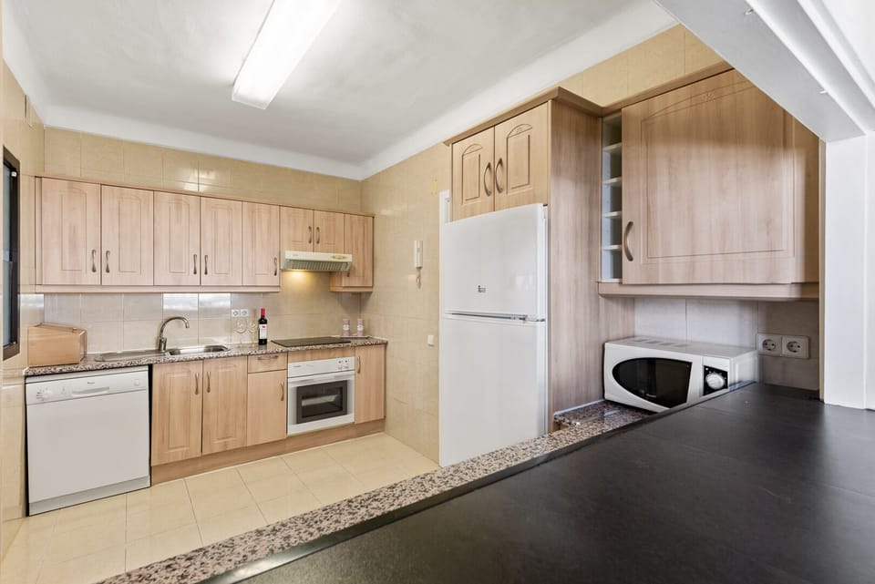 Large, fully equipped kitchen with a separate utility room.  