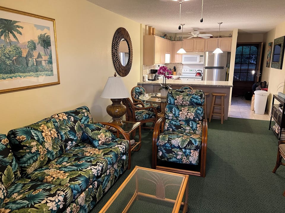 Hawaiian style furniture. Sofa is Hide-a-Bed. Matching dining room chairs.