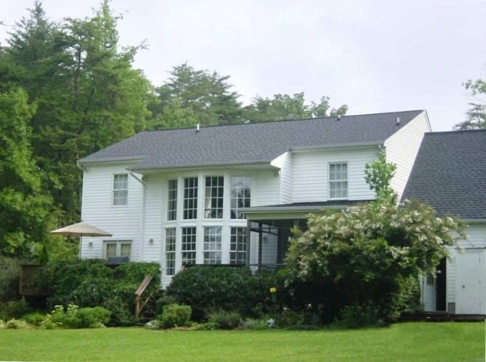 Back house, view of porch and deck. 