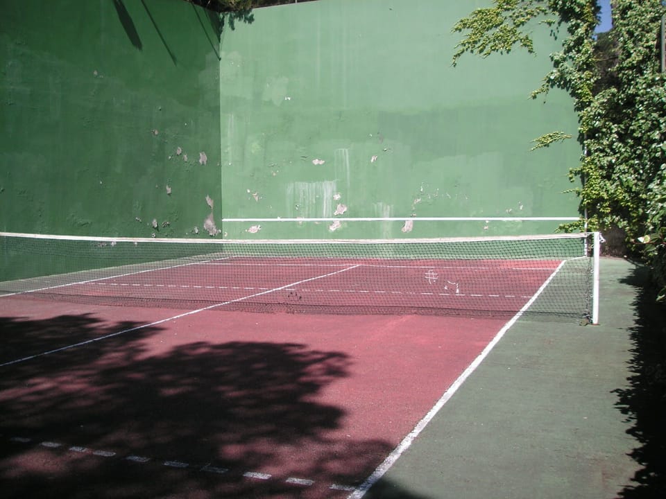 Tennis court is a bit shorter than a regular size but suitable for squash etc.