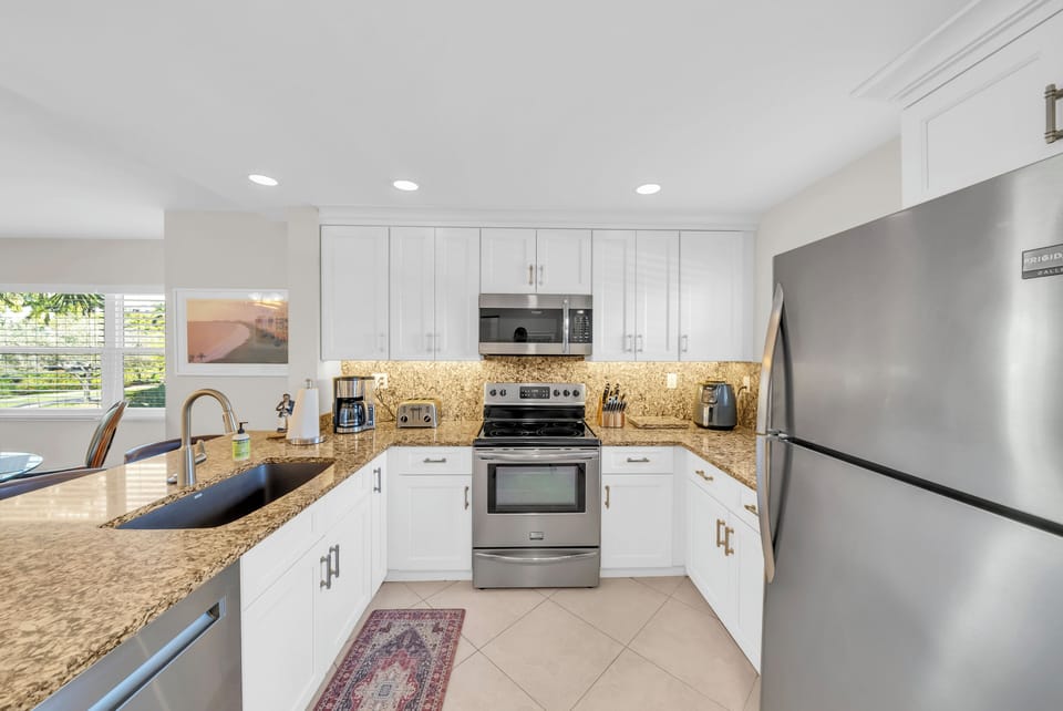 Full Kitchen with all the amenities.   Keurig coffee make and drip coffee maker