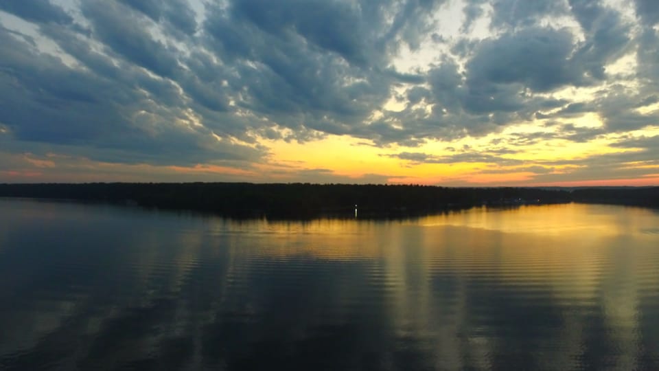 Unwind with stunning sunsets right from the dock on beautiful Lac Courte Oreilles