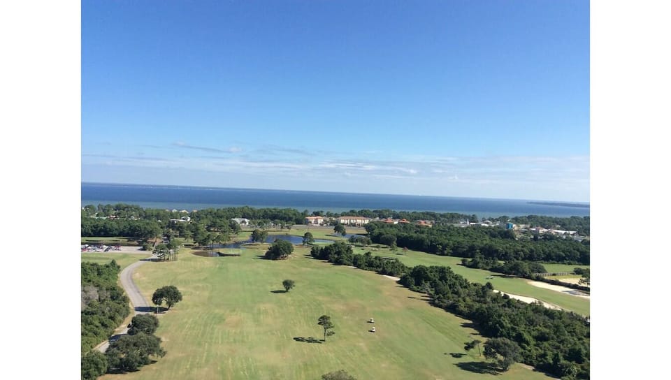 View of onsite Golf Course and View of Bay water in back.