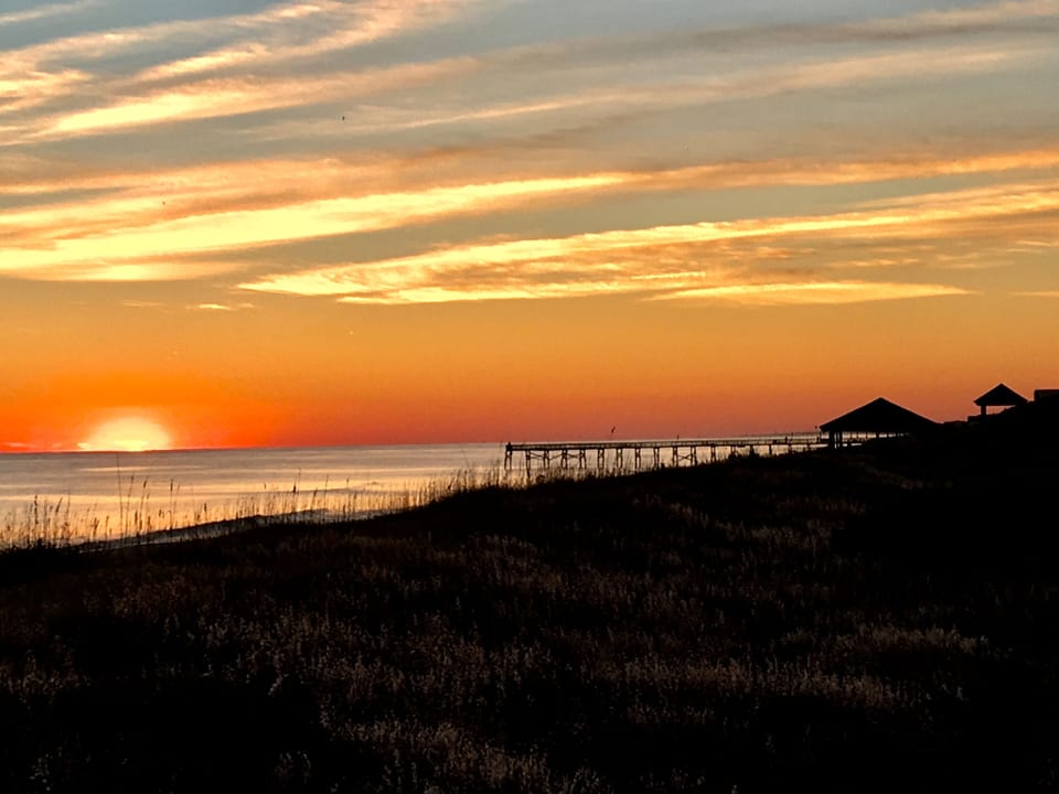 Watching the Sunset from our Gazebo with DoubleTree Pier in Background.