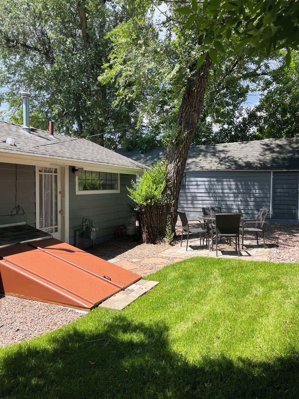 Backyard sitting area and cellar door