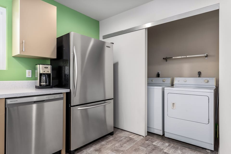Laundry room next to the kitchen