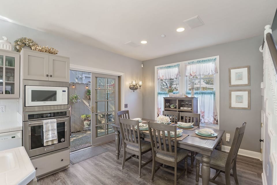 Kitchen and Dining Area with Back Patio Access