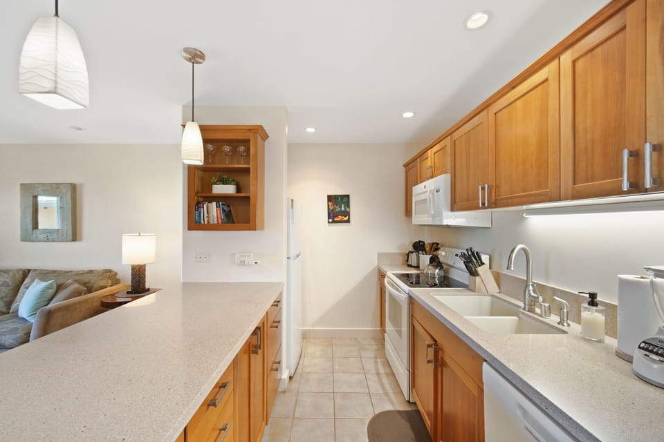 Full Kitchen for all your dining needs - Quartz counter top, dishwasher, toaster, blender, full size stove/oven and more!