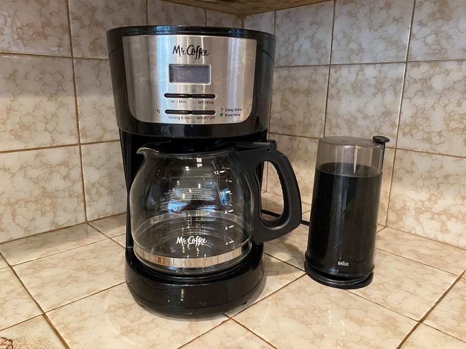 Standard coffee pot with coffee grinder