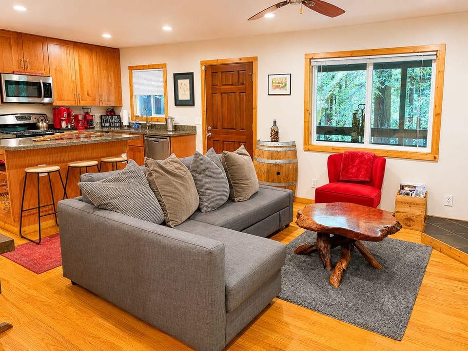 The living room flows easily to the  kitchen