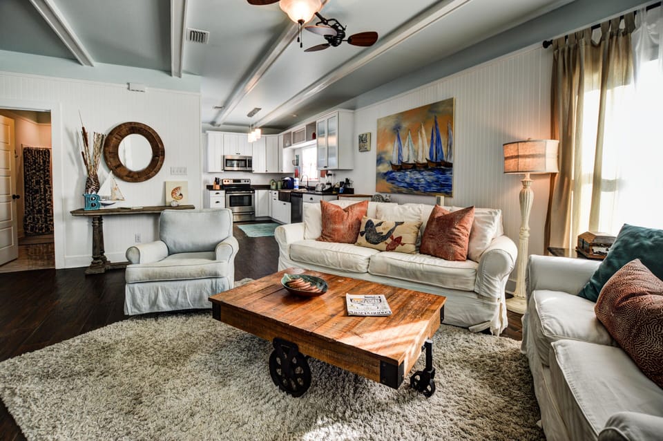 Living Area - The rustic décor provided in this unit offers a quaint, cozy retreat.