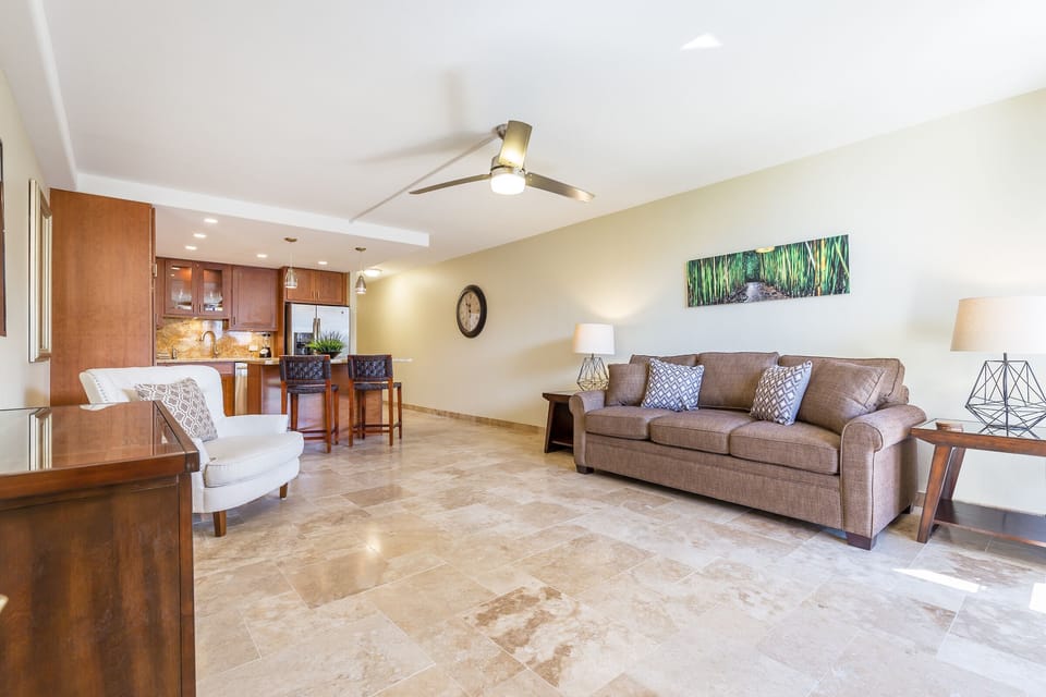 Open Floor Plan With Travertine Flooring Throughout
