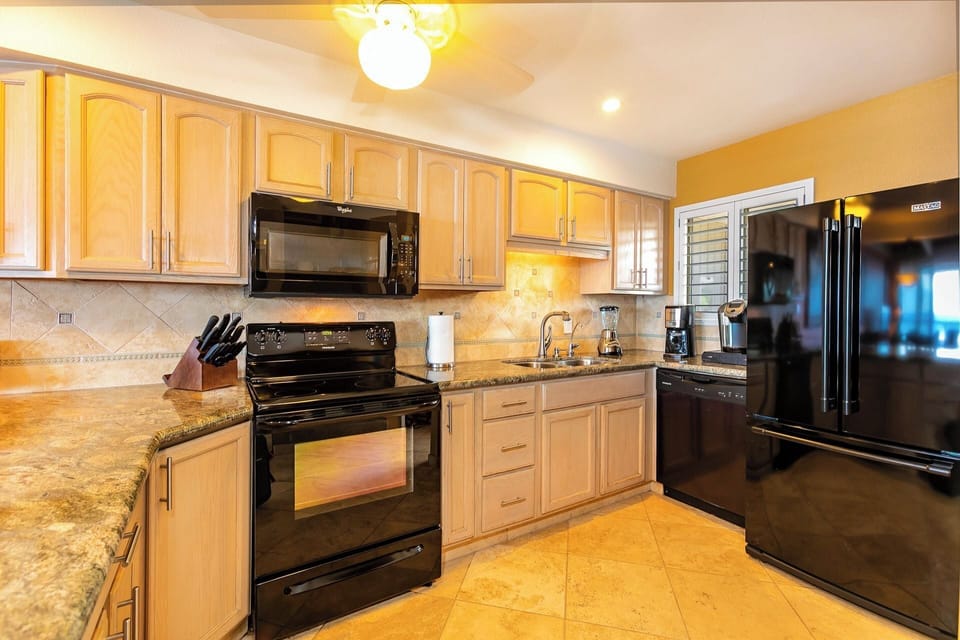 Updated Kitchen with full size appliances and granite countertops.