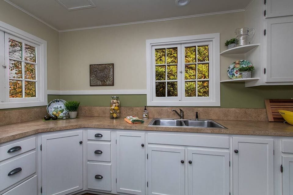 Ample counter space for preparing meals and doing dishes.  Sorry, no dishwasher.