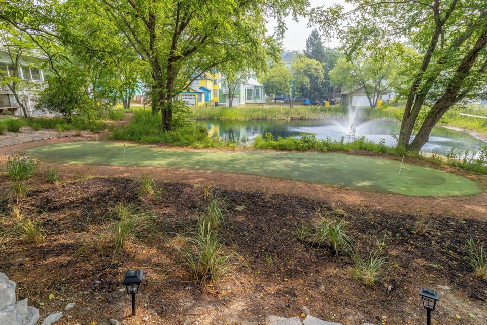Resort Putting Green Behind the House
