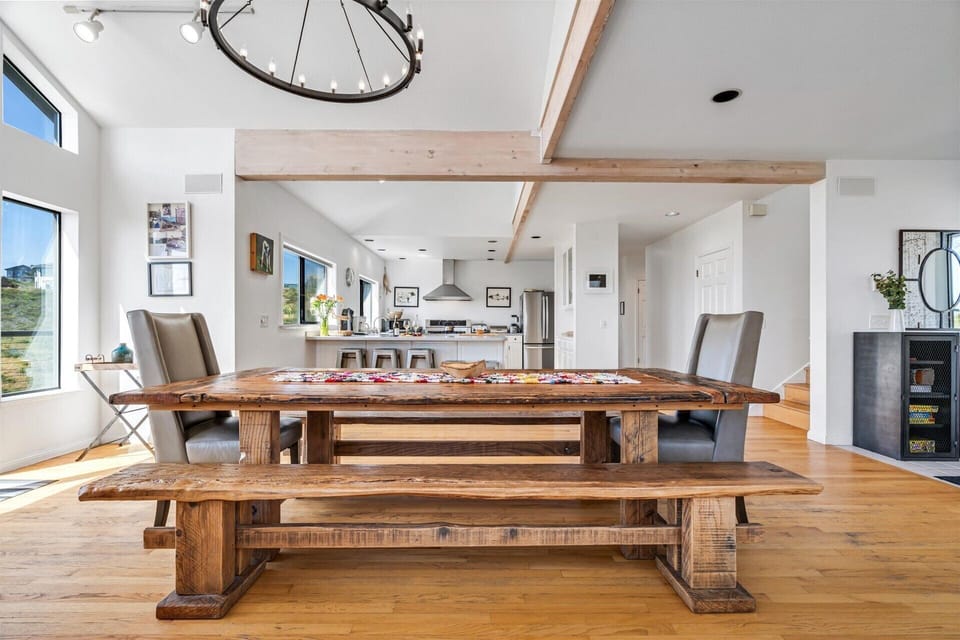 The dining table is large snough to feed a crowd.