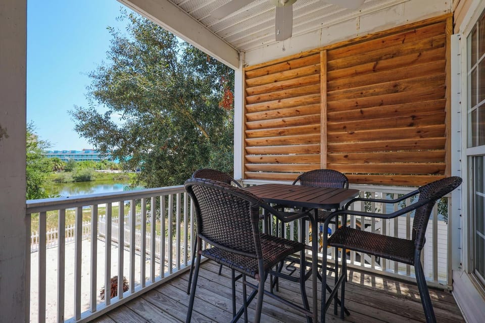 Seating on the Balcony - A pub style table with seating for 4 is featured on the balcony and overlooks Stanton Creek.