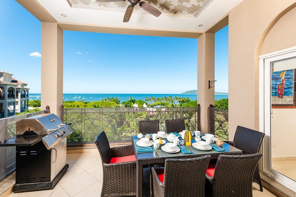 Grill on your balcony overlooking the ocean. 