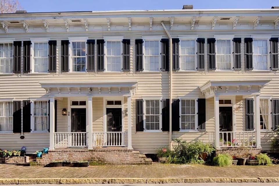Washington Square Abode is the center townhome.