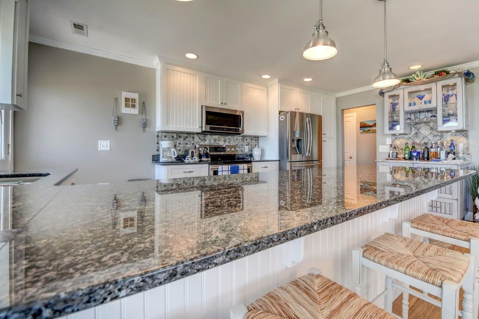 The spacious kitchen is fully equipped for all your cooking needs