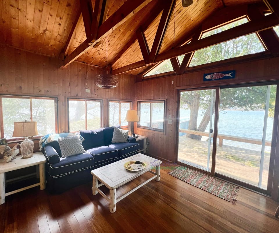 Sitting/family area sliding doors to deck. Views of Lake Leelana - Sitting/family area sliding doors to deck. Views of Lake Leelanau.