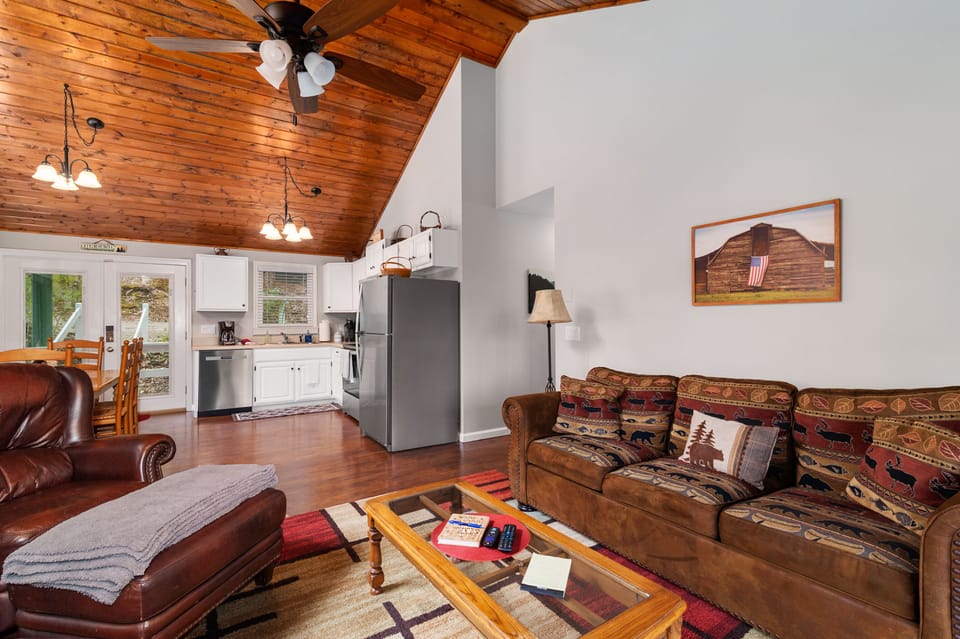 Large open-concept living area.  Gas fireplace, smart TV, eat in kitchen. 