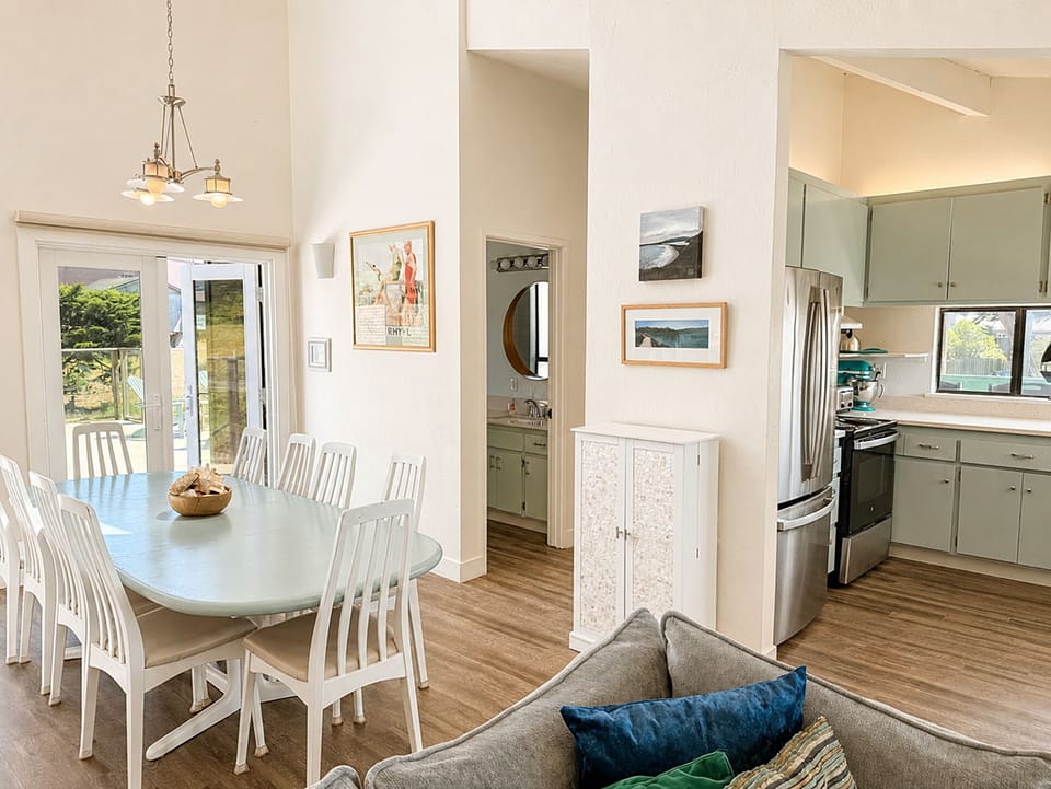 The dining table is steps away from the kitchen, - making great meals super easy.