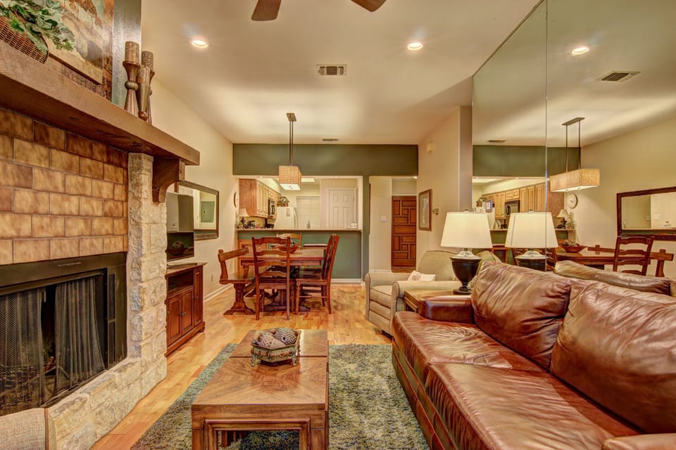 The fireplace gives the condo a lovely, homey feel.