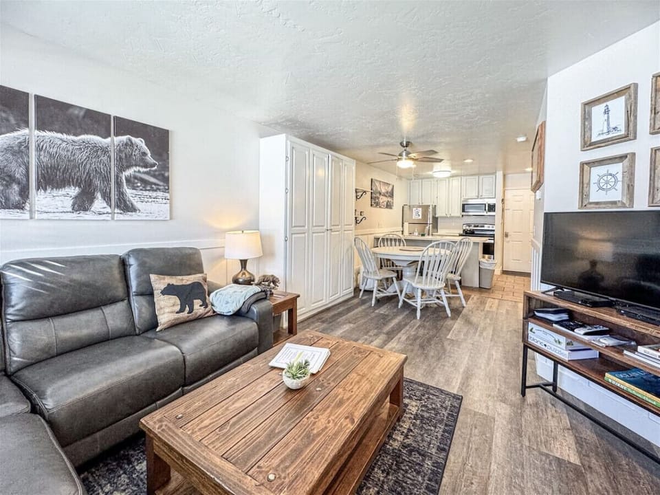 Open-concept retreat with rustic charm, full kitchen, and hidden Murphy bed for extra guests.