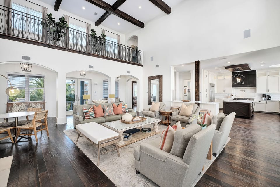 Relax in your stunning living space with soaring ceilings, exposed beams, and stylish furnishings that create the perfect atmosphere for unwinding after exploring.