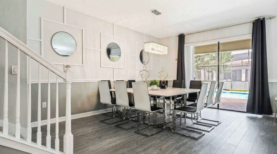 Ample dining space with a large table, perfect for hosting a family feast or gathering
