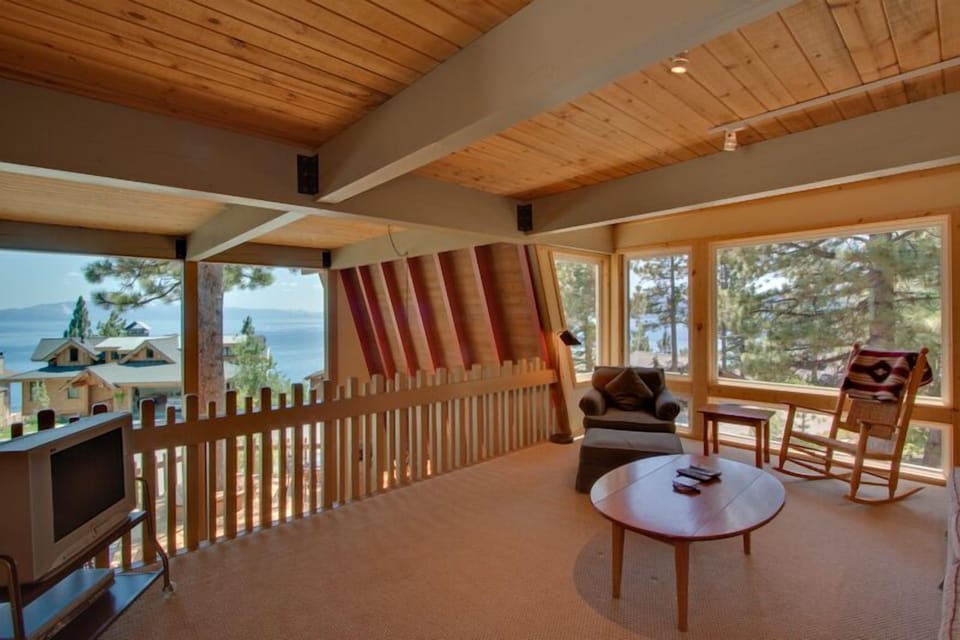 Loft - Lake views, TV, and bathroom are all included in this loft.