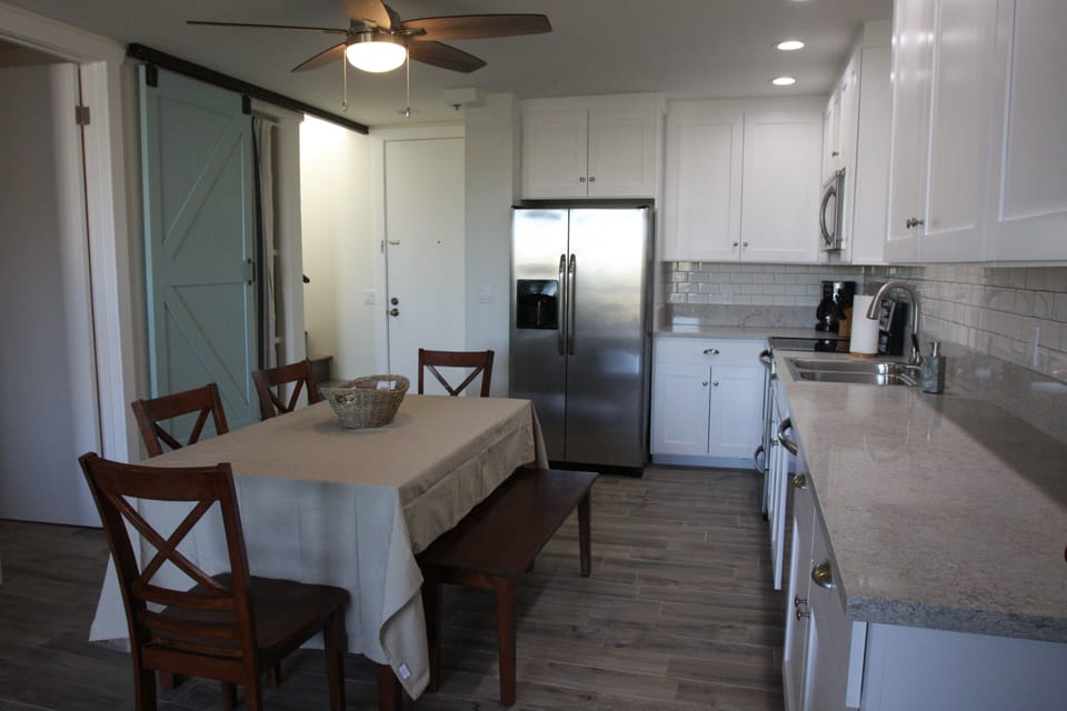 Kitchen and eating area!  Fix your own meals in the full kitchen if you want!