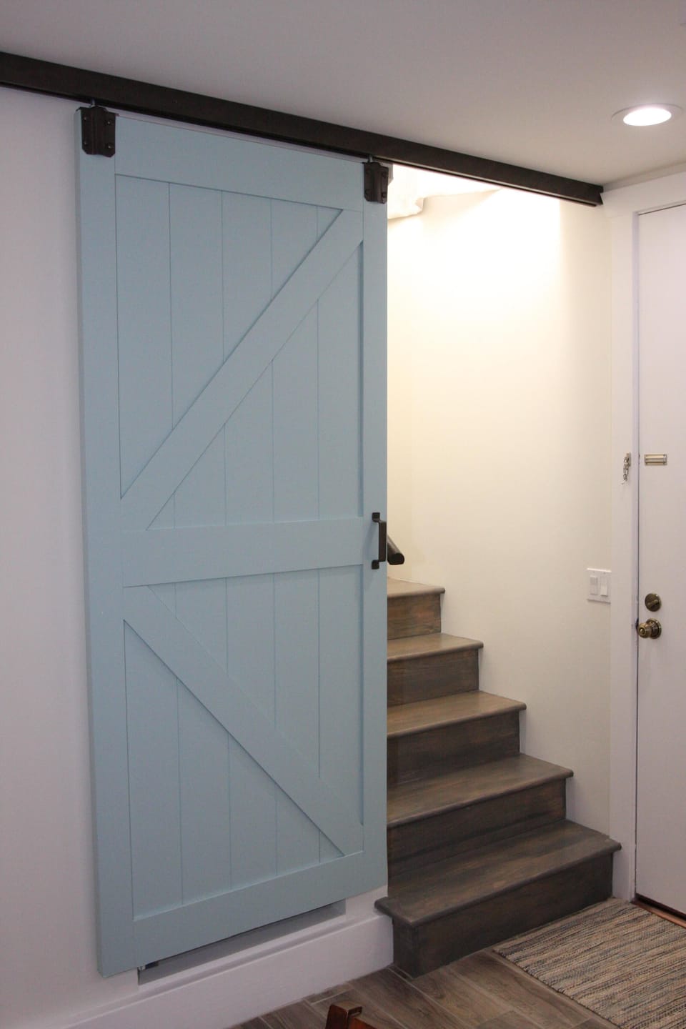 These are the stairs to the master.  The barn door closes and locks for privacy!