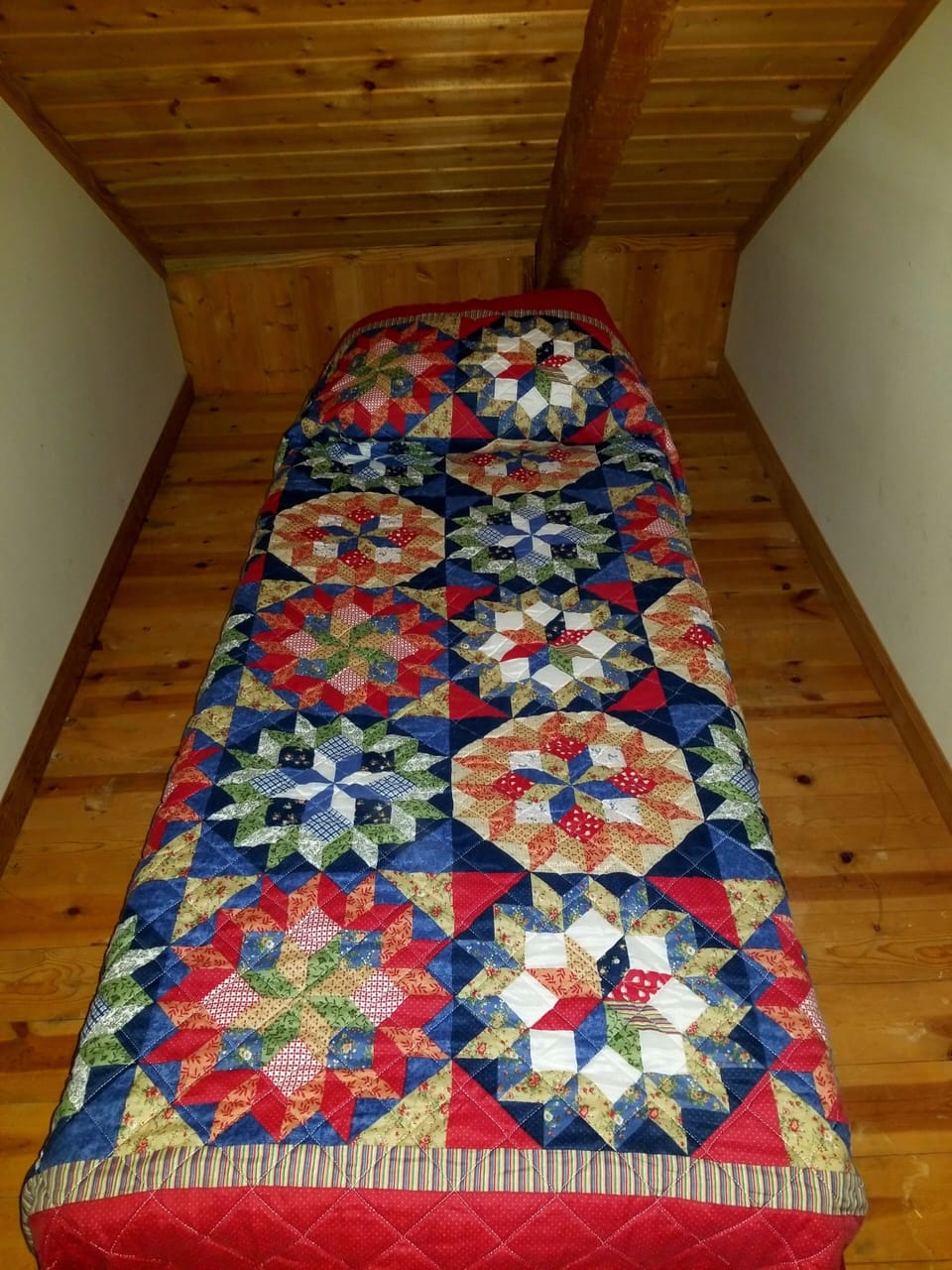 Roll away bed perfect for a child in master bedroom closet.