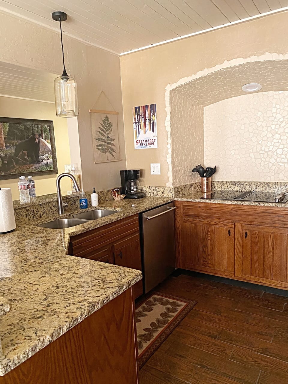 Kitchen with granite countertops and plenty of counter space for cooking.