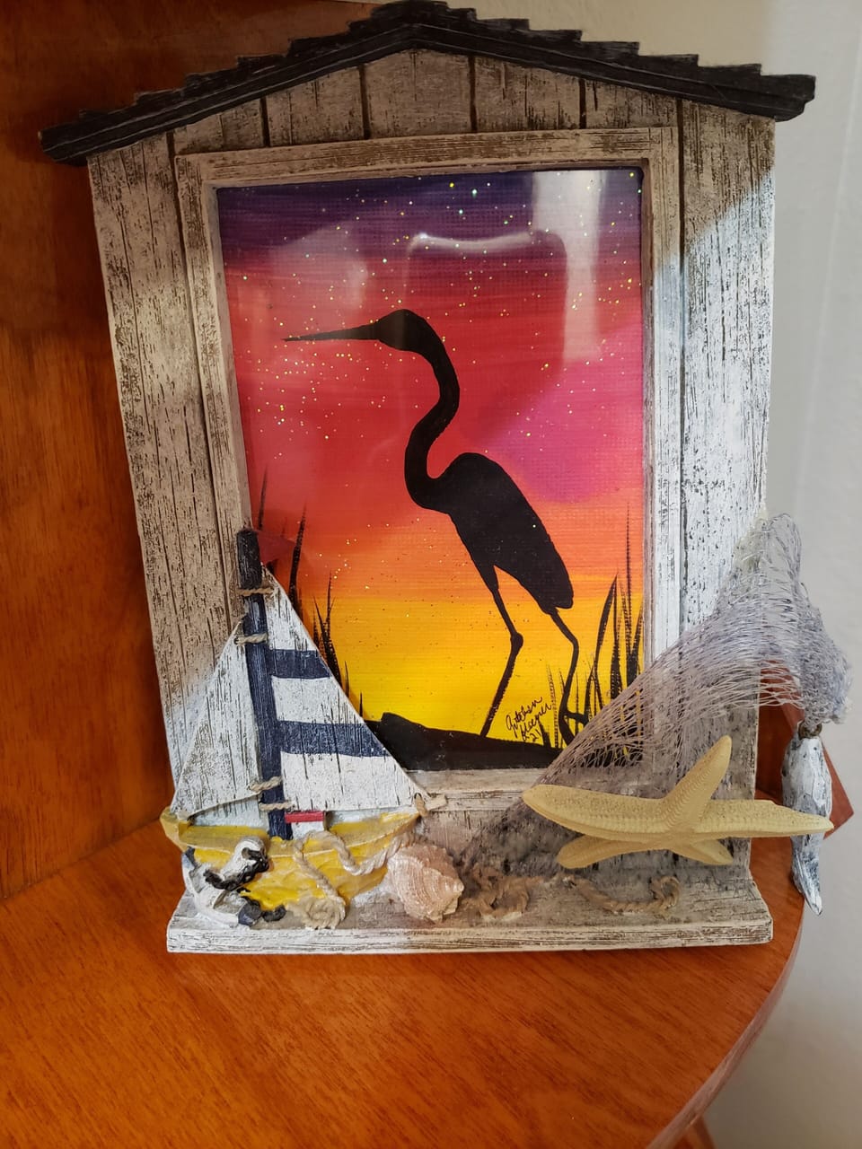 An artist/guest painted a  blue heron she saw in the backyard.