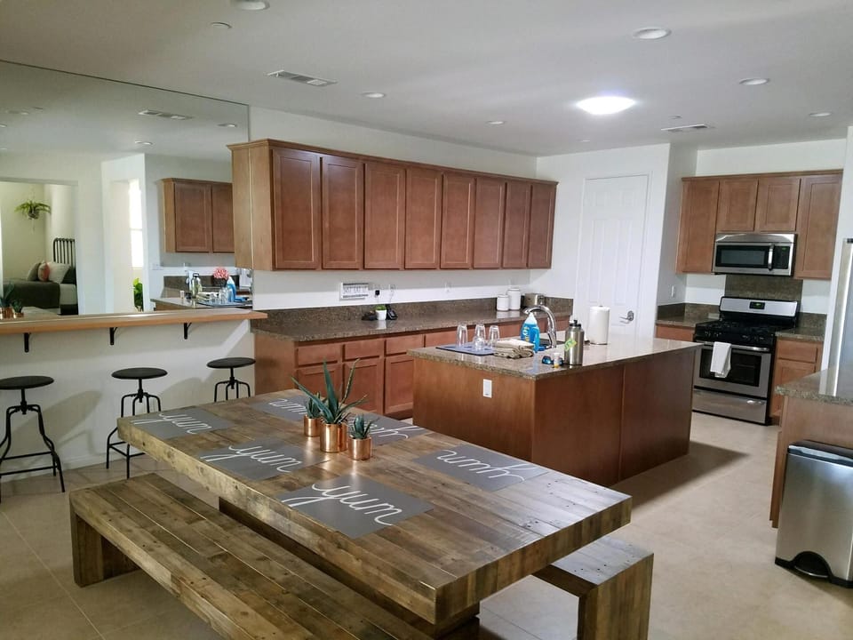 dining table plus extra seats at bar