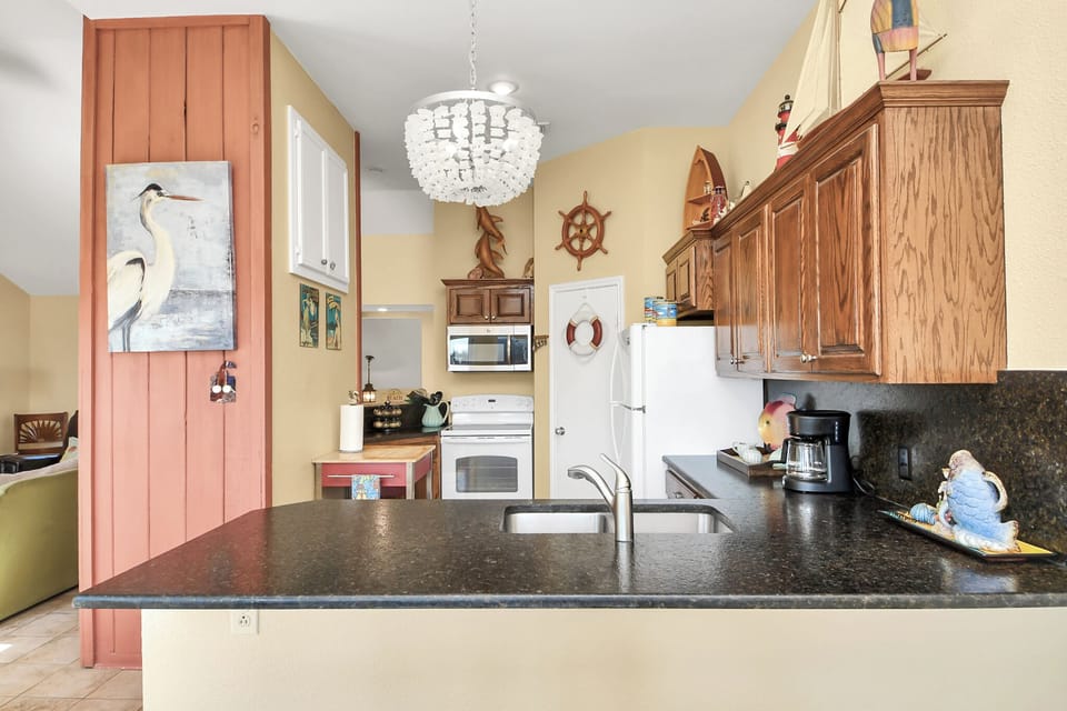 Kitchen view with granite countertops