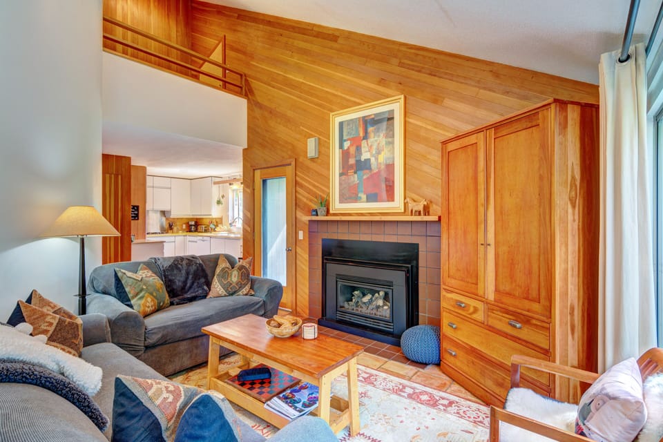 Well designed open floor plan flows from living area to kitchen