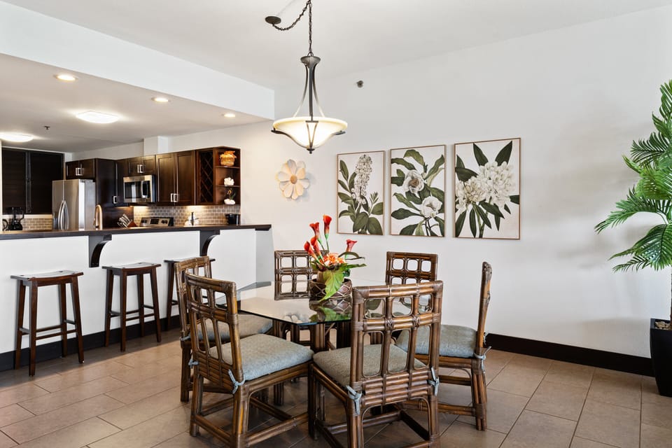 A bright dining nook that flows into the kitchen, perfect for casual bites or lingering conversations.
